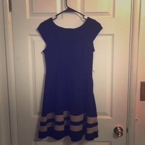 Black dress with two horizontal tan stripes